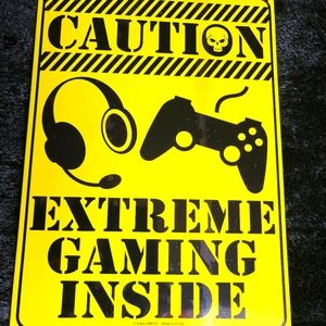 Tin sign to hang on wall Caution Extreme Gaming inside Brandnew Never used.